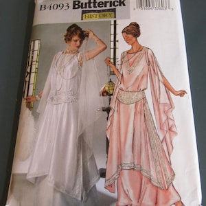 May include: Vintage sewing pattern for a long, flowing dress with a beaded belt. The pattern is from Butterick, and the number is B4093. The pattern is for a dress from the 1920s.
