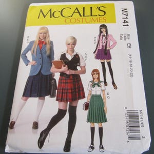 May include: McCall's Costumes pattern M7141 featuring school uniform designs. The pattern includes illustrations of various outfits, including blazers, pleated skirts, and blouses. The size is E5 (14-16-18-20-22).