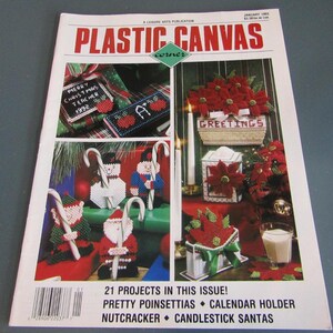 May include: A magazine cover titled "Plastic Canvas Corner" with Christmas-themed craft projects. The cover features images of poinsettias, snowmen, Santa, and other holiday decorations. Text includes "Merry Christmas Teacher 1992" and "21 Projects in this Issue!"