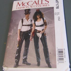 May include: McCall's Fashion Accessories sewing pattern M7176. The pattern features a man and woman in steampunk-inspired outfits, including leather pants, harnesses, and hats. The pattern is size OSZ.
