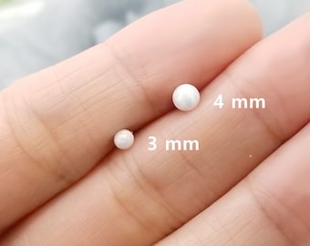 Pendiente de acero quirúrgico con bola de ópalo blanco de 16 g para piercing de cartílago, hélice y caracola.