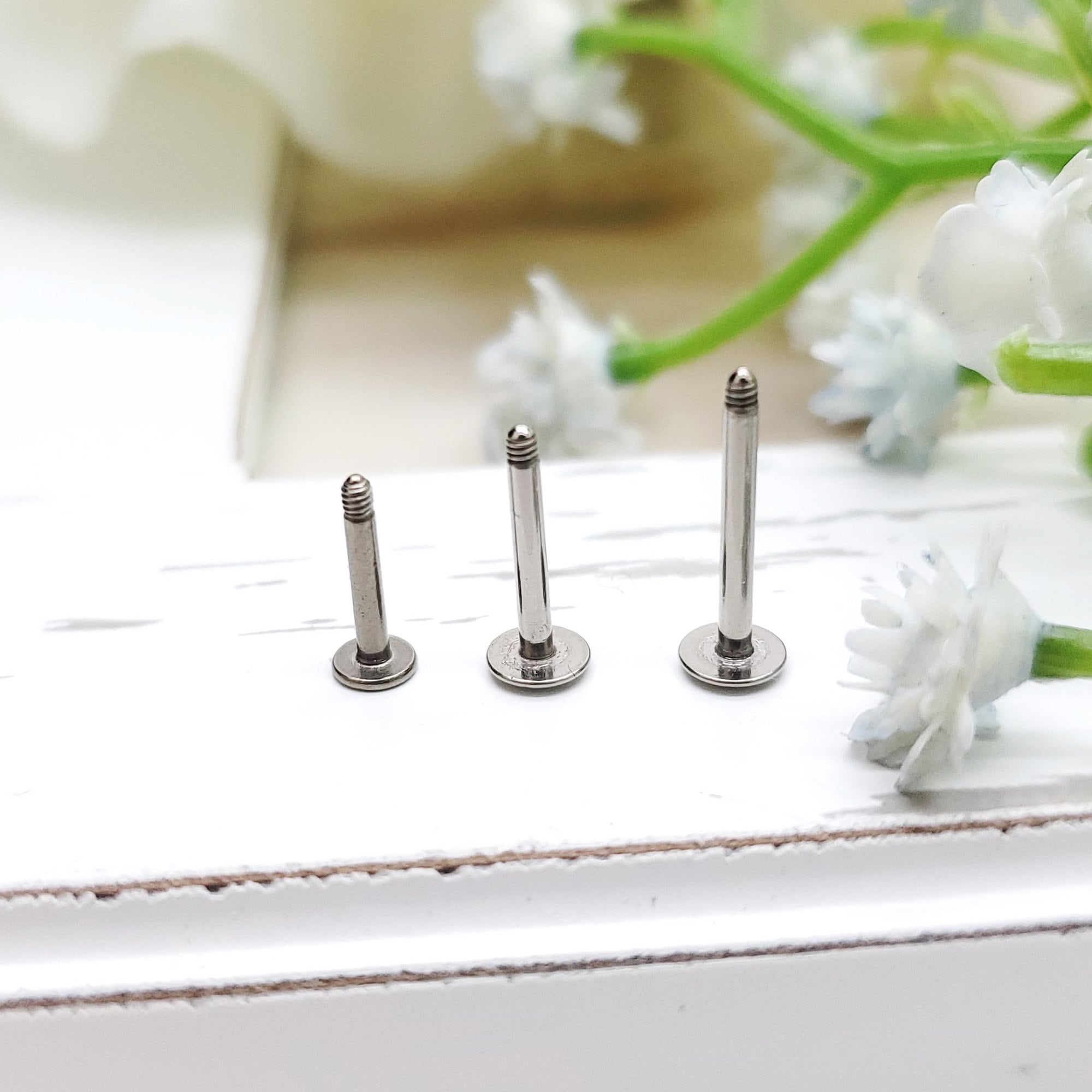 Externally shop threaded earrings