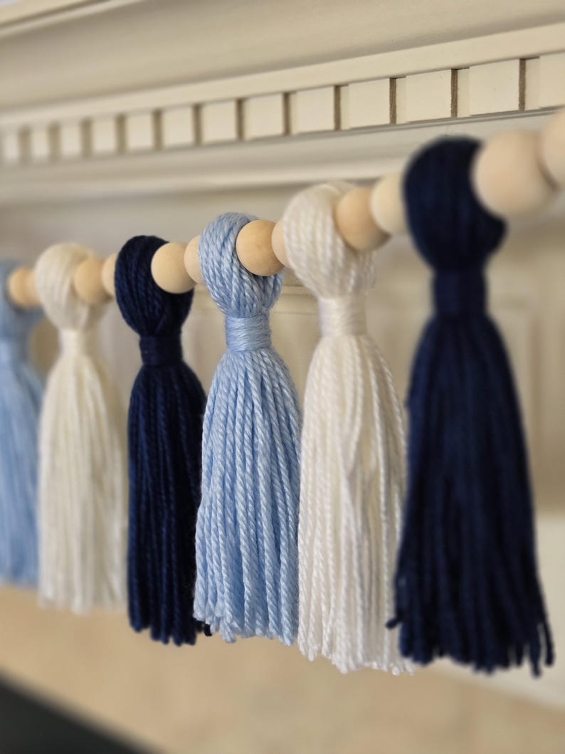 Handmade tassel banner in Carolina blue and white for North Carolina–inspired college parties, tailgates, and alumni events.