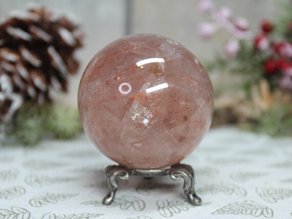 AA+ 64.4 mm Strawberry Quartz Crystal Sphere with Rainbow Foils, Hematoid Inclusions and Faden Lines, 0.78 lb, 12.6 oz Ball from Brazil