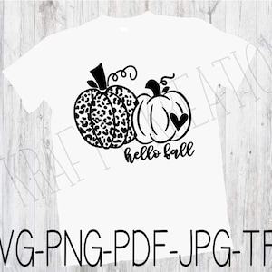 May include: Black and white graphic design featuring two pumpkins. One pumpkin is a solid black outline with a heart on it. The other pumpkin is filled with a leopard print pattern. The text "hello fall" is below the pumpkins.