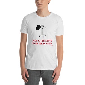May include: White t-shirt with a black cowboy hat on a medical oxygen tank. The text "NO GRUMPY FOR OLD MEN" is printed in red on the shirt.
