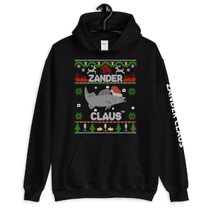 Zander Claus Christmas sweater - Ugly sweater look with small signature in design and logo on left arm -Zander Claus ® hoodie
