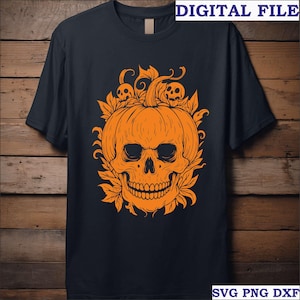 May include: Black t-shirt featuring an orange pumpkin skull design with leaves and small skulls. The words "DIGITAL FILE" and "SVG PNG DXF" are printed on the shirt. A Halloween-themed graphic tee.