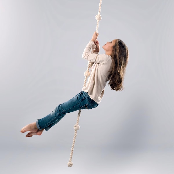 Scandinavian climbing rope for indoor kids space. This climbing rope easily supports the weight of any two adults. They can climb or swing.