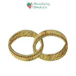 May include: Gold embroidered wedding rings, a symbol of love and commitment, perfect for adding a touch of elegance to your crafts.