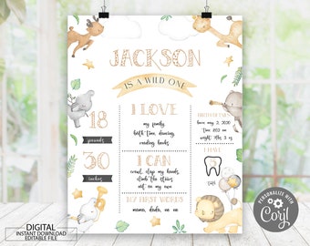Puede incluir: Un letrero imprimible blanco con el texto "JACKSON IS A WILD ONE" e ilustraciones de animales. El letrero incluye detalles como el peso (8,16 kg), la altura (76,2 cm) y los datos de nacimiento. También enumera cosas que al niño le encantan y puede hacer.