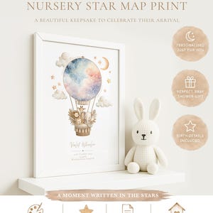 May include: A framed nursery star map print featuring a watercolour hot air balloon illustration with a giraffe, lion, and elephant in the basket. The print includes celestial constellations, clouds, a crescent moon, and personalised birth details.