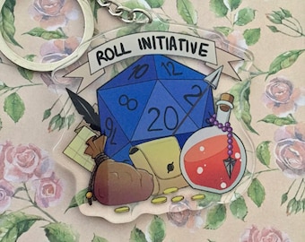 May include: A blue 20-sided die with a white outline and black numbers, surrounded by a quill pen, a rolled-up scroll, a brown pouch, a yellow pouch, and a red potion bottle with a purple stopper. The die is on a white background with the text "ROLL INITIATIVE" in black.