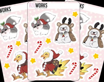 May include: A set of six Christmas-themed stickers featuring a squirrel, a reindeer, and a phoenix wearing Santa hats. The stickers are on a pink background with white stars and candy canes.