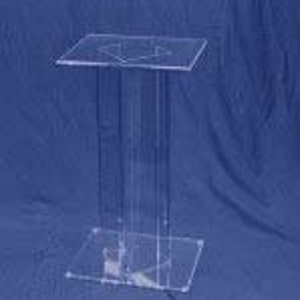 May include: Clear acrylic pedestal stand with a square top and base. The stand is approximately 18 inches tall.