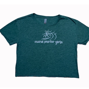 May include: A green cropped t-shirt with a white graphic of a surfer girl and the text "maui surfer girls".