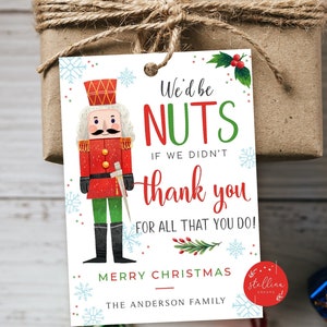 May include: A white Christmas gift tag with a cartoon illustration of a nutcracker. The tag says "We'd be NUTS if we didn't thank you for all that you do! Merry Christmas - The Anderson Family".