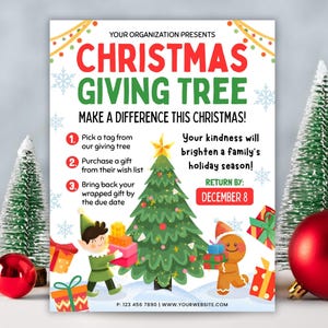 May include: A Christmas Giving Tree poster with a festive design. The poster features a Christmas tree, gift boxes, and cartoon characters. Text includes "Christmas Giving Tree" and instructions for participation. Red ornaments and miniature trees are also present.