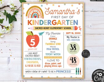 May include: A colorful, framed kindergarten sign with the text "Samantha's First Day of Kindergarten." It includes an apple graphic, a rainbow, and details like height (38 inches) and weight (48 pounds).