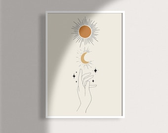 May include: A minimalist line art print featuring a hand reaching up towards a sun and moon with stars. The sun is yellow and the moon is white with a black outline. The background is a light beige color.