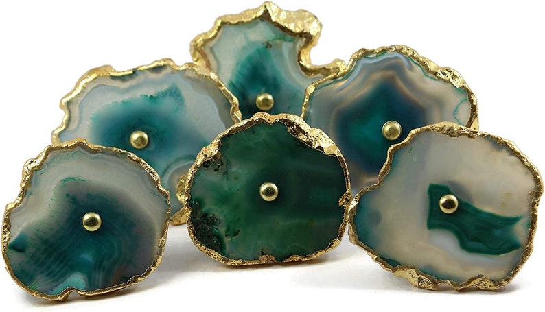 May include: Six green and white agate drawer pulls with gold trim. Each pull has a small gold knob in the center.