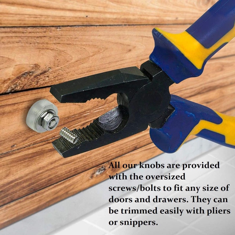 May include: Close-up of a pair of blue and yellow pliers holding a small silver screw. A white plastic knob with a silver screw is visible in the background. The text "All our knobs are provided with the oversized screws/bolts to fit any size of doors and drawers. They can be trimmed easily with pliers or snippers." is visible below the pliers.