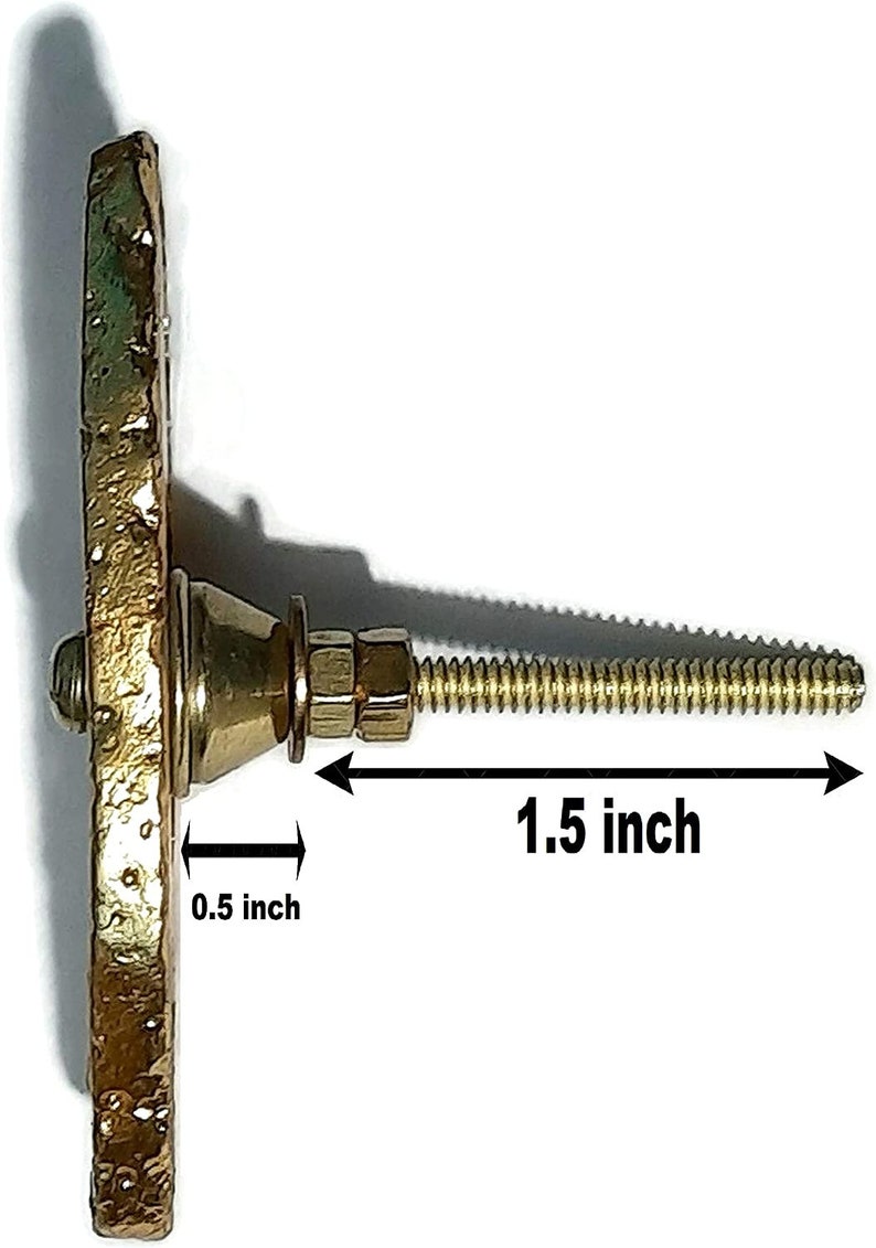 May include: Gold-toned metal cabinet knob with a 0.5 inch diameter and a 1.5 inch long screw.