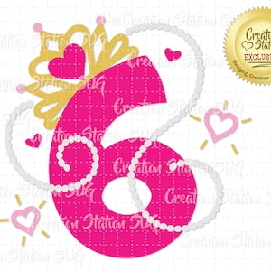 May include: Pink number six with a gold crown and white pearl necklace. The number is decorated with pink hearts. The text "Creation Station EXCLUSIVE" is on a gold circle.