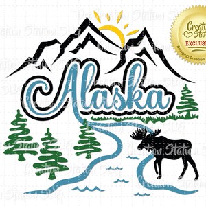May include: A blue and black graphic design featuring the word "Alaska" with a mountain range, a river, trees, and a moose silhouette. The design is labeled "Creation Station Exclusive".