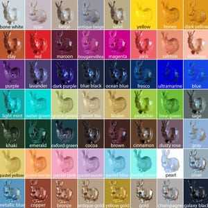 Puede incluir: Un gr&aacute;fico con 60 figuritas de conejo de cer&aacute;mica de diferentes colores. Los conejos est&aacute;n todos en la misma pose, con las orejas levantadas y la cola hacia abajo. Los colores van del blanco al negro, con muchos tonos intermedios.
