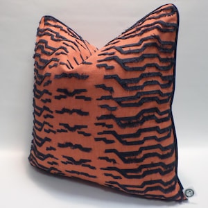 May include: A set of three ceramic mugs with a speckled, matte finish. The mugs are in shades of cream, light gray, and dark gray. Each mug has a simple, minimalist design, perfect for coffee or tea.