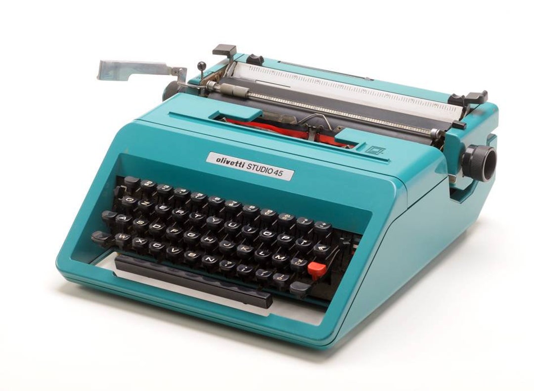 OLIVETTI STUDIO 45 en perfecto estado de funcionamiento menta máquina de  escribir QWERTY layout is available Sottsass design -  México