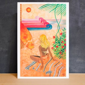 May include: Watercolor print of a beach scene with a woman sitting on a towel, facing the ocean. The artwork features a surfboard, palm trees, and colorful waves. The color palette includes orange, pink, blue, and green.
