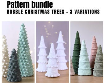 May include: A pattern bundle for crocheting three variations of Christmas trees. The trees are made with bobbles and are shown in green, white, and pink.