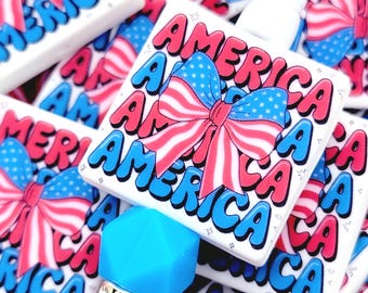 SET OF 2, Patriotic Focal Bead, America Coquette Bow Focal Bead, Fourth Of July Focal Silicone Print Bead, Flag Wristlet Keychain Beads
