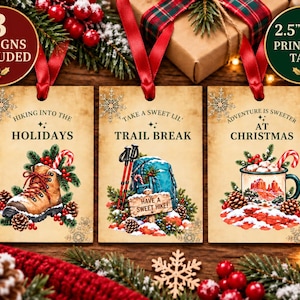 May include: Three rectangular gift tags measuring 2.5 inches by 3.5 inches with red ribbon loops. The tags feature vintage-style illustrations of a hiking boot, a backpack with trekking poles, and a mug of cocoa, with holiday-themed text.