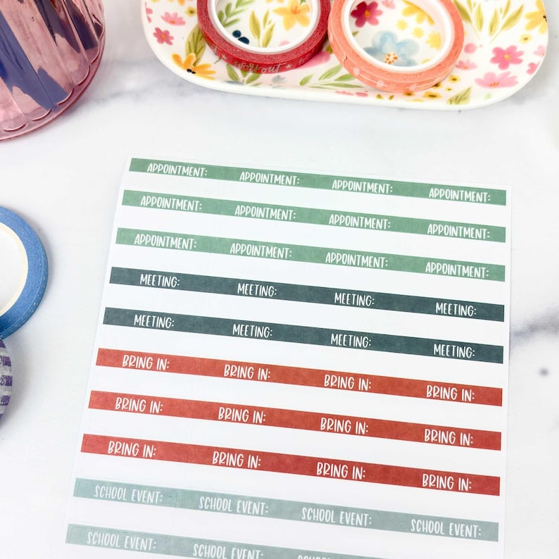 May include: A rectangular sticker sheet featuring rows of labels with text. The labels are organized by color: light green with "APPOINTMENT:", dark green with "MEETING:", terracotta with "BRING IN:", and sage green with "SCHOOL EVENT:" printed in white.