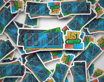 May include: A sticker with a cartoon illustration of a computer RAM stick. The sticker is white with a blue, green, and black RAM stick. The text on the sticker says "Just Download More RAM".