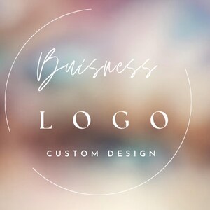 May include: A white circle with the text "Business LOGO CUSTOM DESIGN" on a blurred background of pink, blue, and brown.