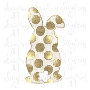 May include: A white bunny silhouette with gold glitter polka dots. The bunny is facing away from the viewer with its tail visible.