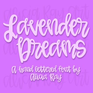 May include: Lavender Dreams, a hand lettered font by Alicia Ray, is a white font on a purple background.