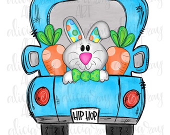 May include: A blue pickup truck with a white bunny rabbit in the back. The bunny is wearing a green bow tie and holding two carrots. The truck has the words "Hip Hop" on the back.