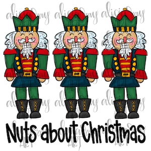 May include: Three cartoon nutcracker figures in green, red, and blue uniforms with white beards and mustaches. The text "Nuts about Christmas" is written in black below the figures. The nutcrackers wear black boots and red hats.