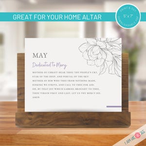 May include: A printable 5x7 inch card with a floral design and the text "MAY Dedicated to Mary" and a prayer to Mary, Mother of Christ. The card is designed for use as a home altar decoration.