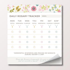 May include: A Daily Rosary Tracker notepad with a floral design at the top. The notepad features a weekly layout with spaces to mark each day's prayers. The text includes "Daily Rosary Tracker" and a quote from St. Padre Pio.