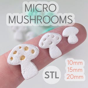 Könnte beinhalten: Drei weiße Keramikpilze in verschiedenen Größen, 10 mm, 15 mm und 20 mm, mit goldenen Akzenten auf dem größten Pilz. Die Pilze befinden sich auf einem Finger und der Text "STL" ist darunter sichtbar.
