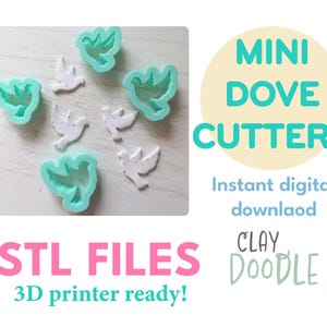May include: The image shows white dove-shaped objects and teal-colored dove-shaped molds. The text on the right says "MINI DOVE CUTTERS" and "Instant digital download". Below, the text says "STL FILES 3D printer ready!" and "CLAY DOODLE".
