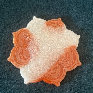 Red and white marbled coaster