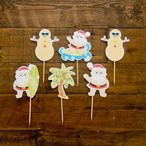 Merry Birthday Cupcake Toppers: Customize Your Characters, Christmas in July Party Ideas, Surfing Santa Food Picks | Fully Assembled