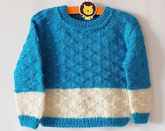 Hand knitted blue sweater with white stripe